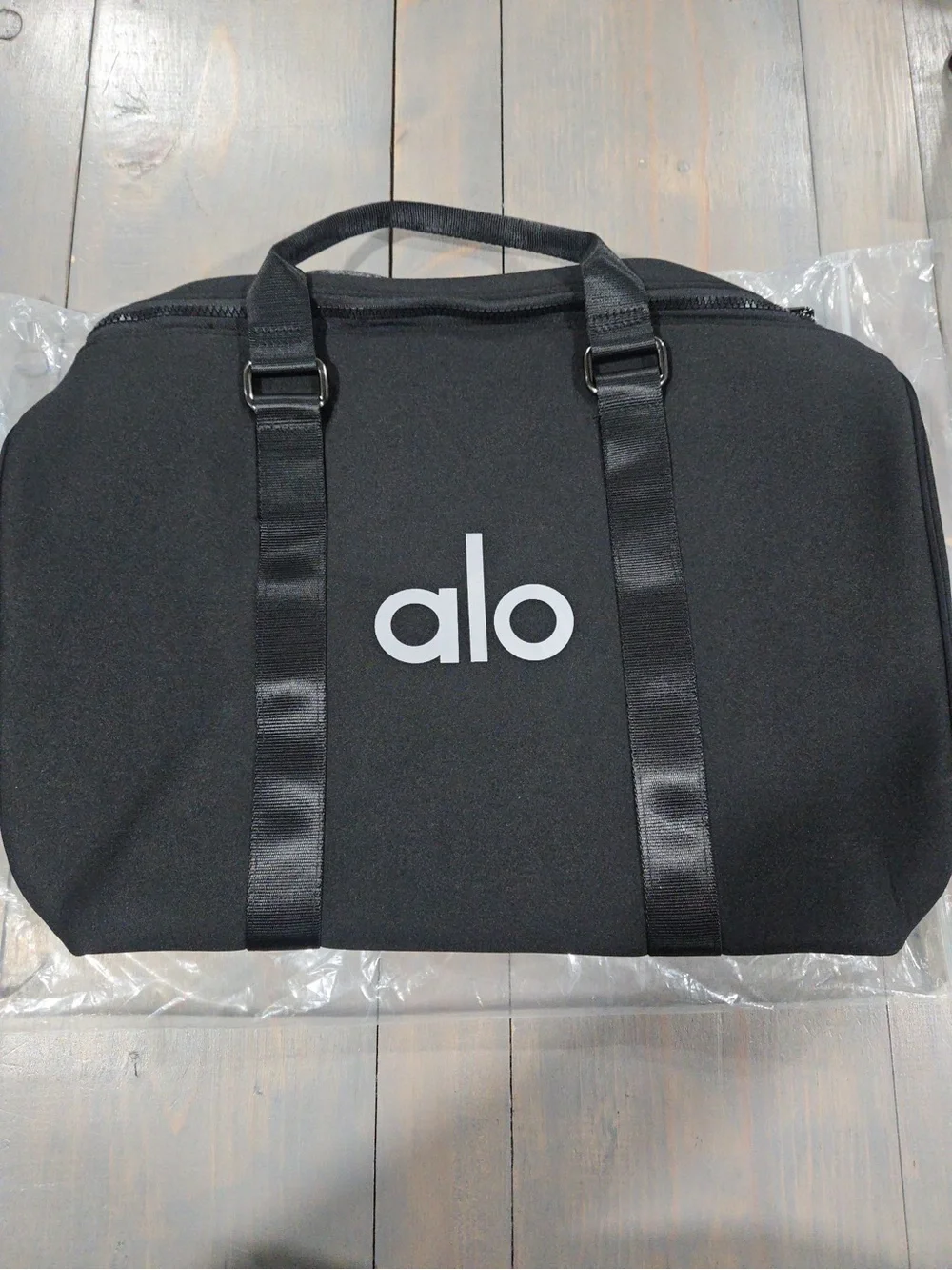 ALO Yoga Black Duffel Bag with White Logo traverse gym workout fitness travel